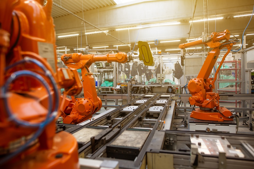 Robotic arm manufacturing equipment representing 3D-printed nuclear pressure vessels for reactor construction