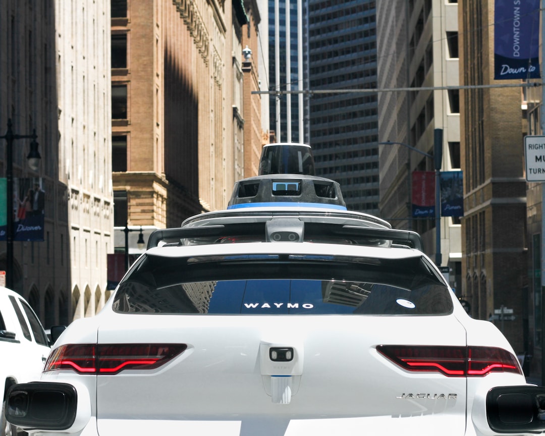 Autonomous vehicle on a city street, representing Waymo's Houston robotaxi service expansion