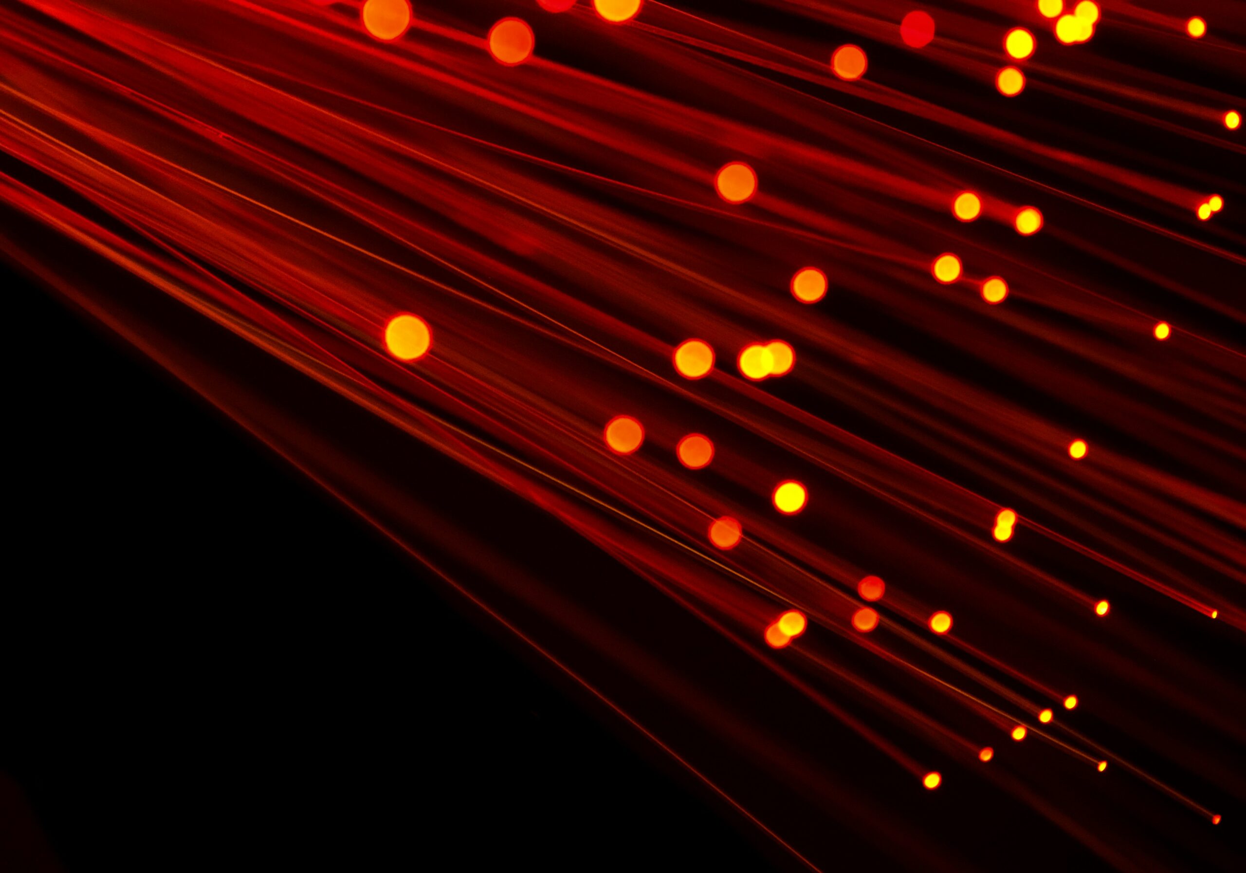 Abstract fiber-optic light streaks representing the speed gains from Solana's slot time upgrade