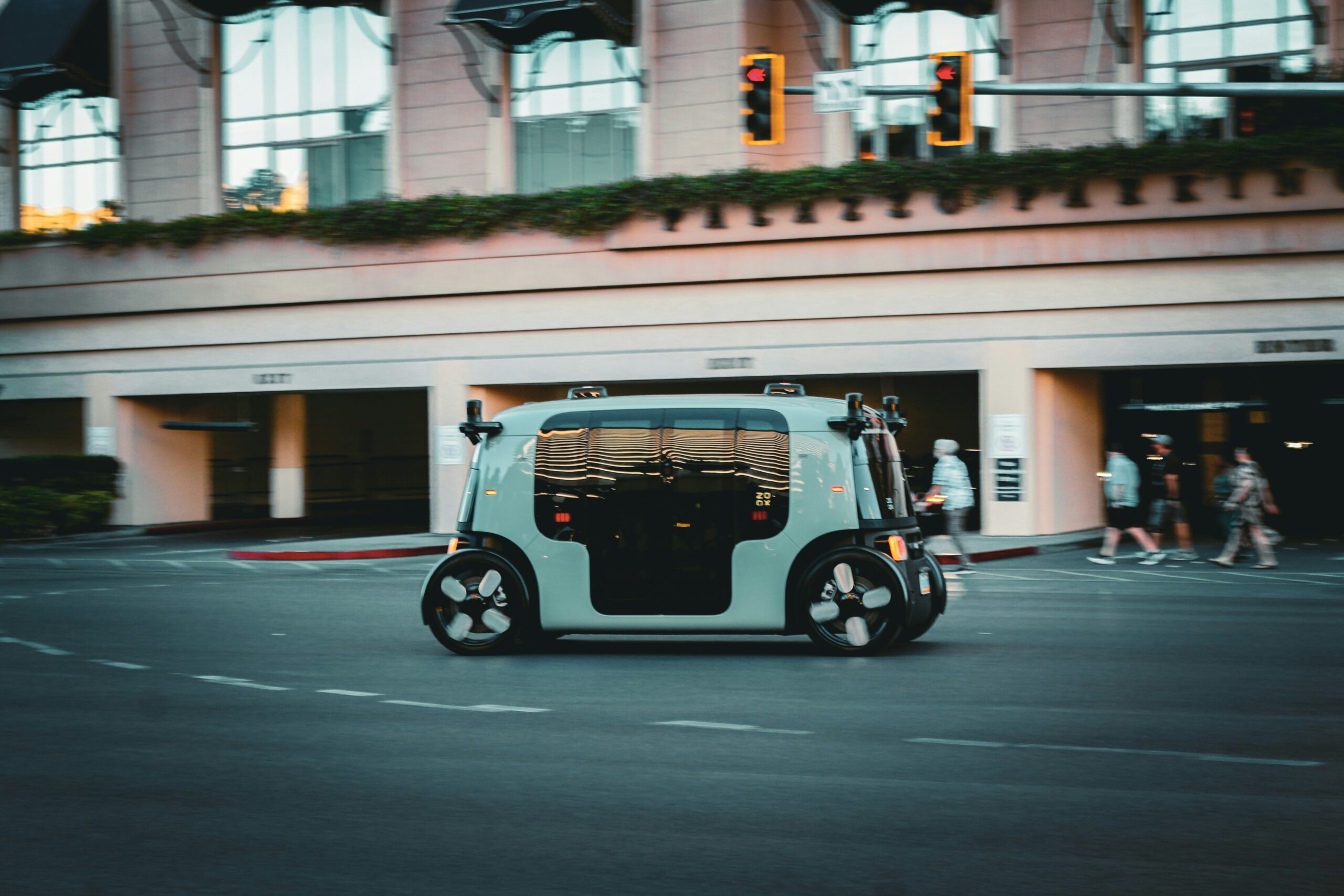 Autonomous vehicle on a city street, representing the Tesla robotaxi expansion improving transportation access