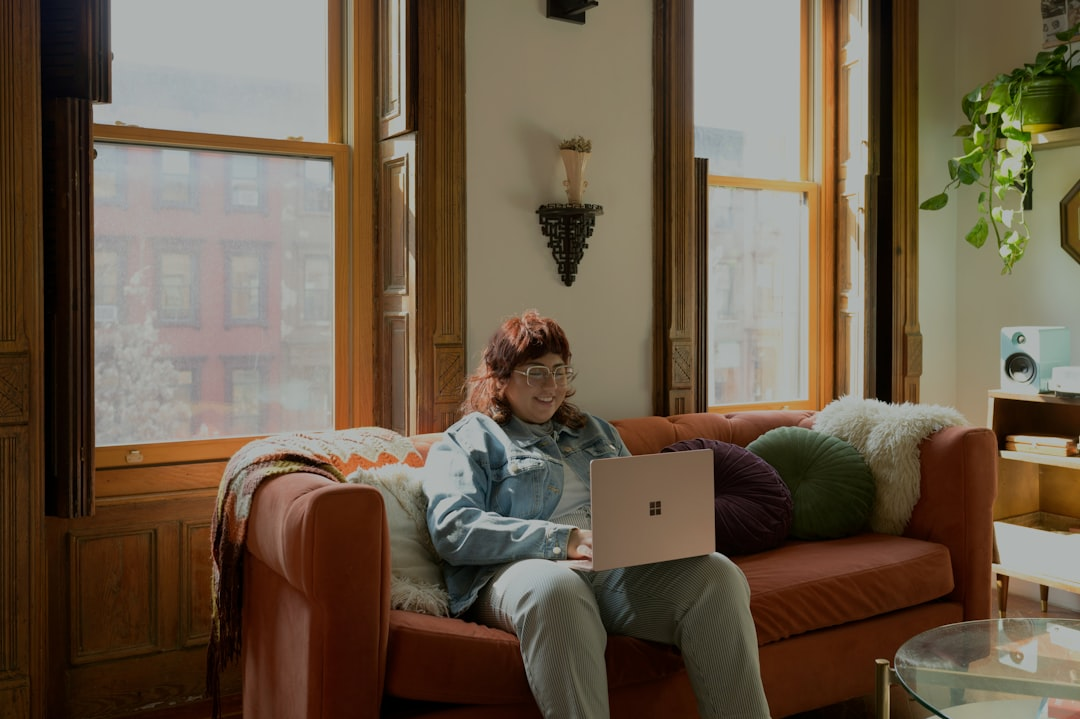 Person using a laptop at home, representing the Chicago Connected program's free internet access