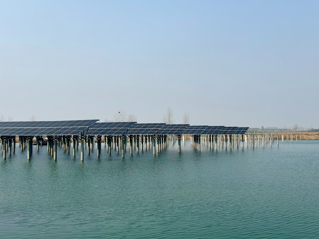 Floating solar reservoir panels covering calm water to generate clean power without using land