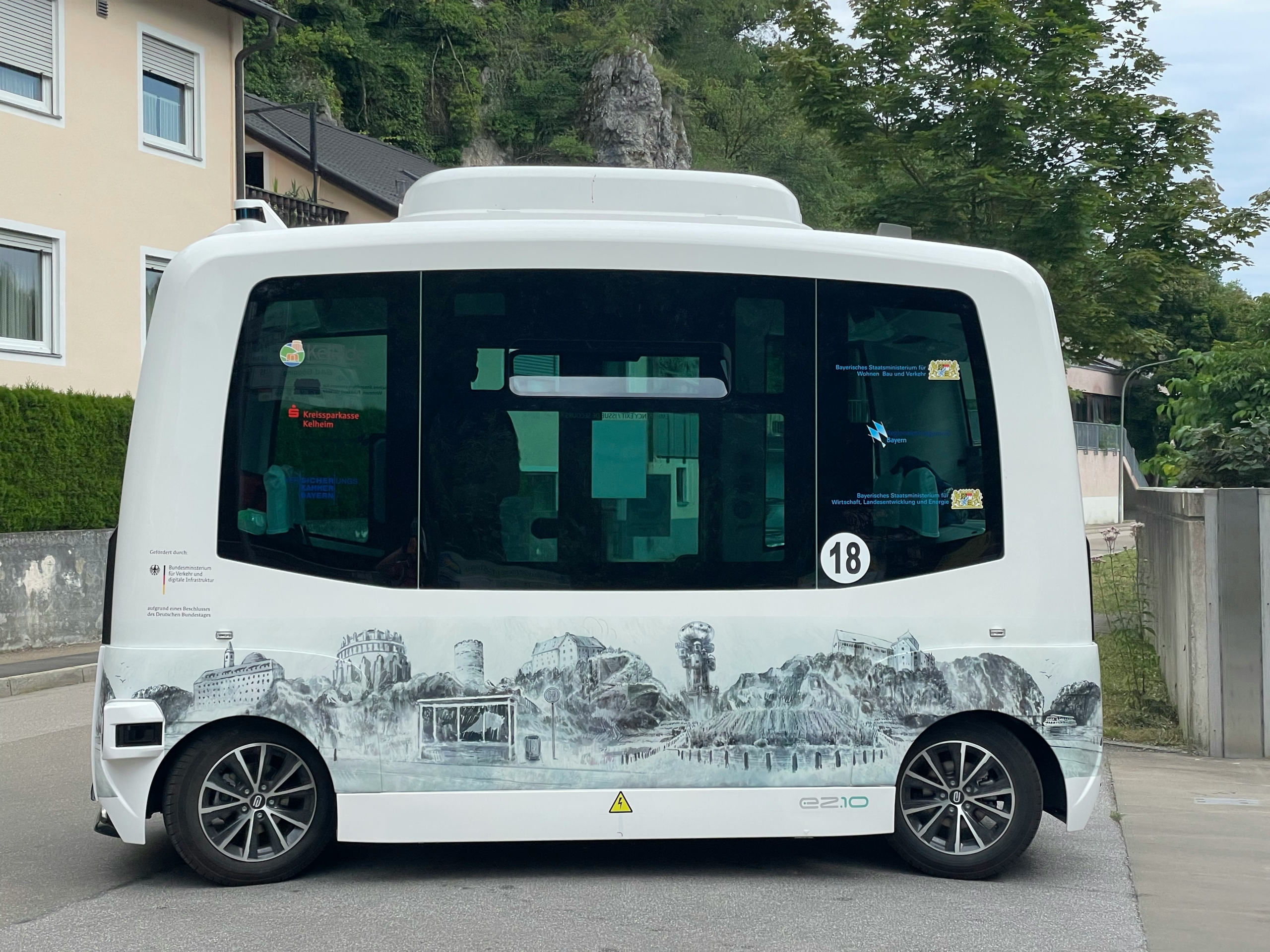 Driverless shuttle van on a street, representing Lake Nona autonomous shuttle service