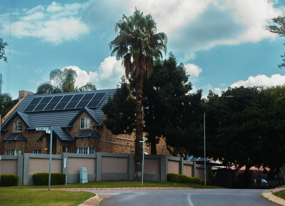Solar panels on a home roof, part of New York's free heat pumps and solar savings push