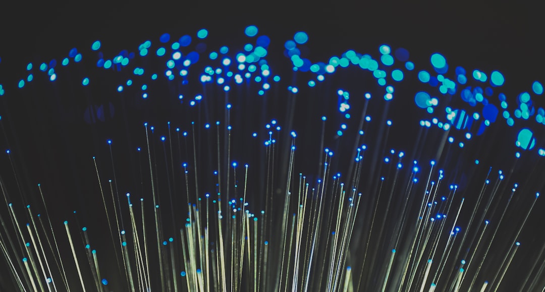 Glowing fiber optic cables symbolizing Oregon's rural fiber expansion bringing broadband to homes