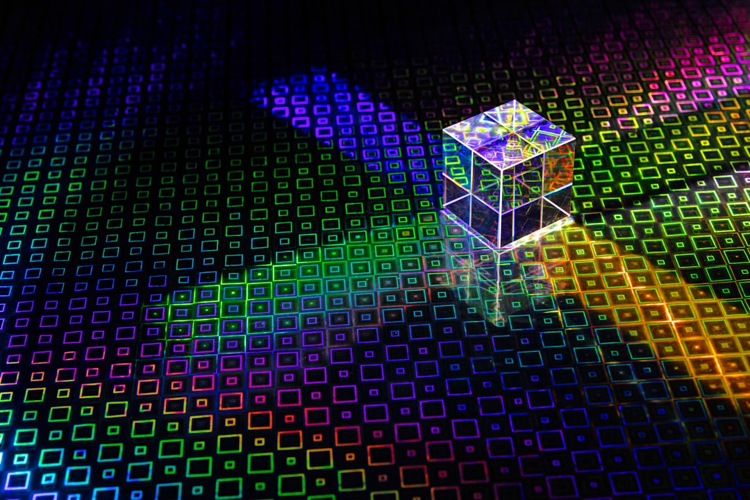 Abstract glass prism refracting rainbow light, representing QuEra laser automation in quantum computing