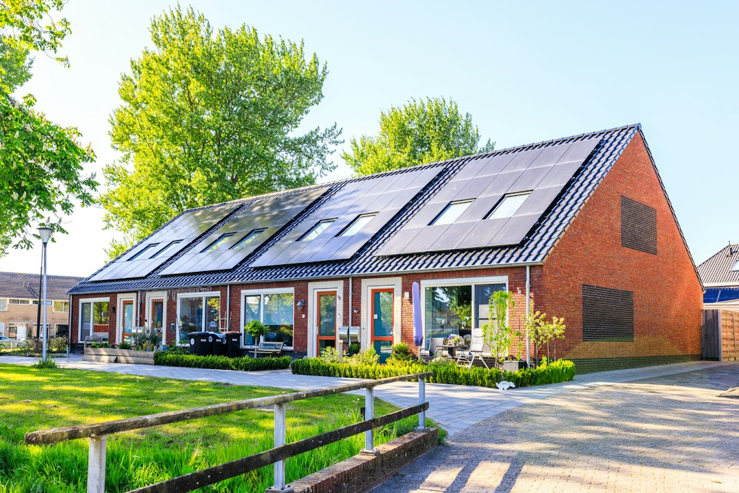 A home with rooftop solar panels installed through the Solar for All program