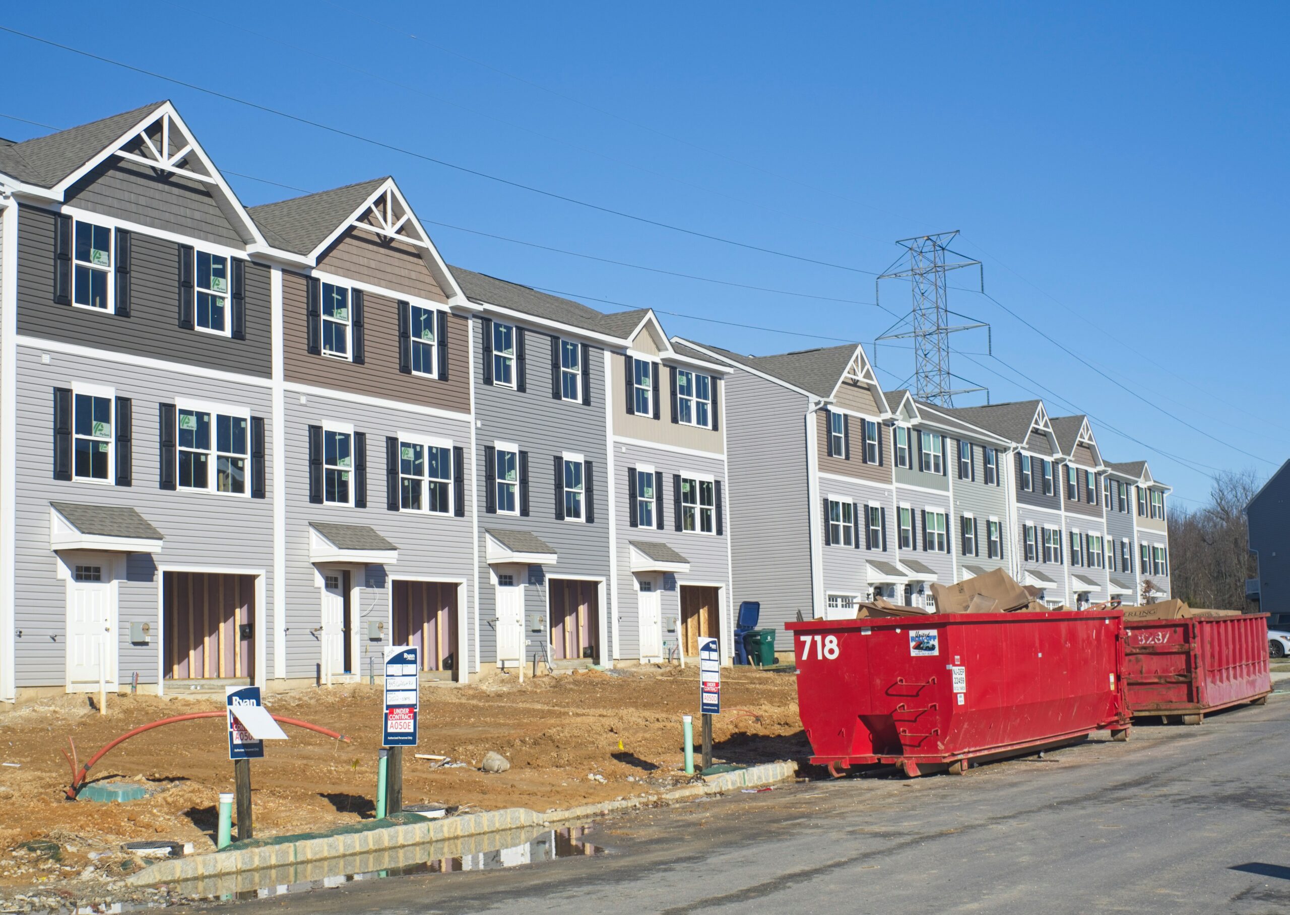 Row of townhouses under construction, representing homes helped by Toronto's AI permit pre-check tool