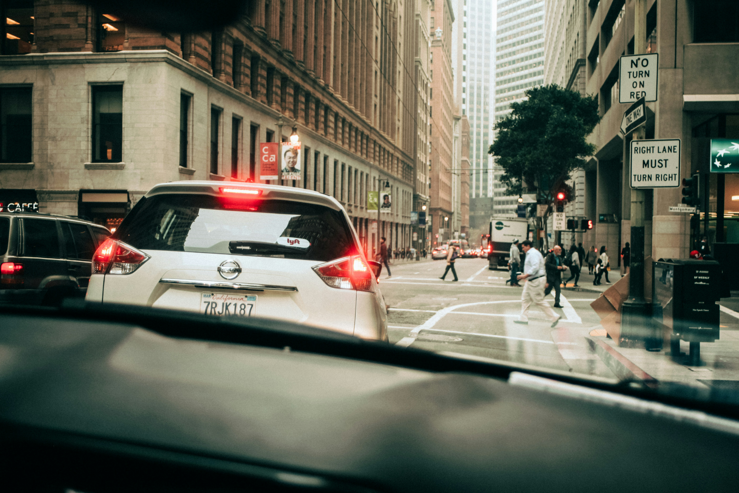 A self-driving car on a San Francisco street, part of Waymo Transit Rewards linking robotaxi trips to public transit.
